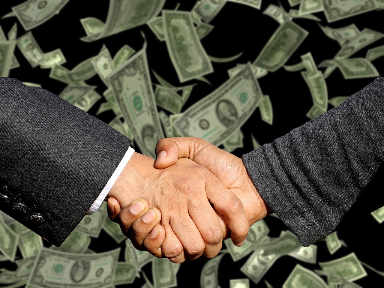 Handshake, agreement, trade — How Much Does Renters Insurance Cost in Ohio Compared to Other States?