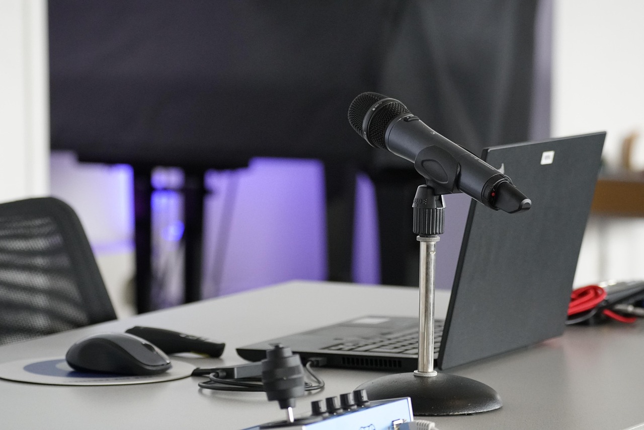 Laptop, conference table, mouse — Top Office Spaces in Victoria for Modern Professionals
